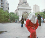 Photo of torture victim in orange jumpsuit.