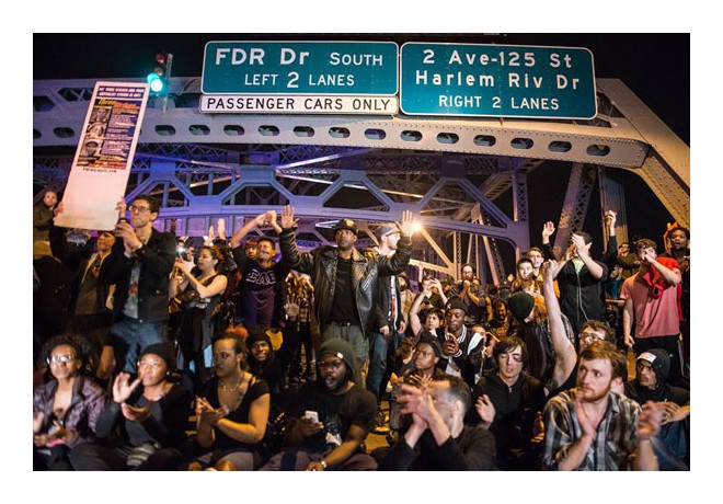 NYC, 11/24: Blocking the Triborough Bridge, which connects Manhattan with the Bronx and Brooklyn. Photo: Stephanie Keith