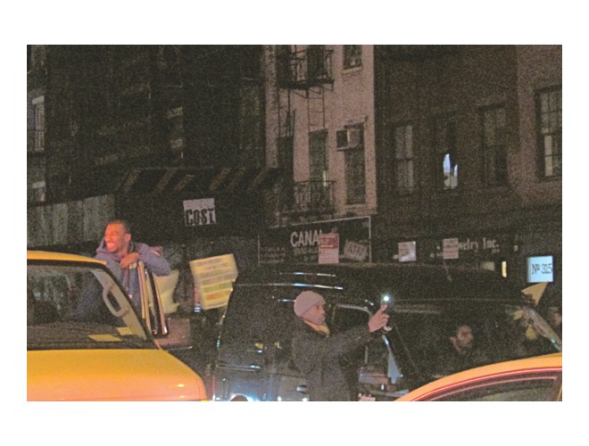 Cars and trucks honked in rhythm with protest chants.