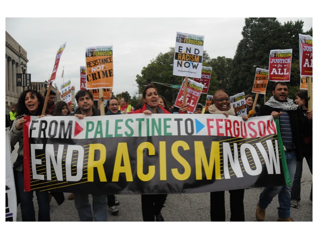 Oct 11: Palestinian activists in the streets of St. Louis.   Photo: Li Onesto/<em>Revolution</em>/revcom.us