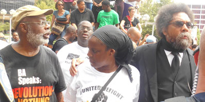 Carl Dix and Cornel West getting arrested in Ferguson August 10