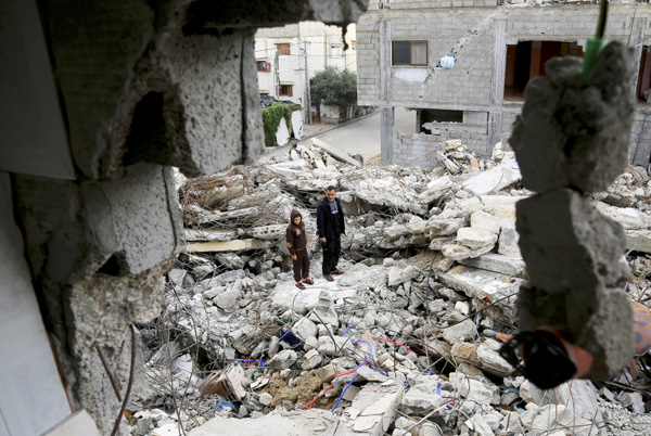 The Nusseirat refugee camp in the central Gaza Strip turned to rubble from a July 31 Israeli airstrike that killed 13 people from two families