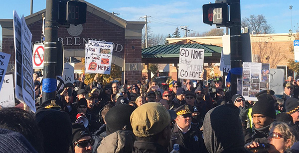 White supremacists tell protesters to "go home" 