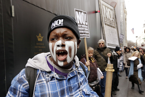 Protest in front of Trump Tower, January 11. (Photo: AP)