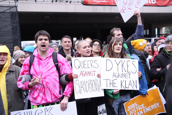 Protestors with signs 'Queers against Islamophobia' and 'Dykes against the klan' in Washington D.D., January 20, 2017.