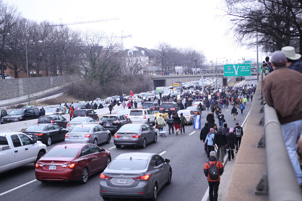 People from Black Lives Matter chain themselves to protest Donald Trump, Washington, DC, January 20. 