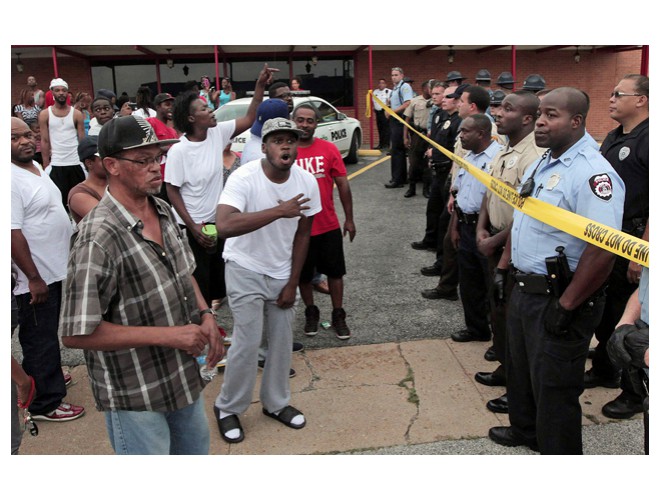 Ferguson, people confronted the police immediately after Michael Brown's murder. Photo: AP 