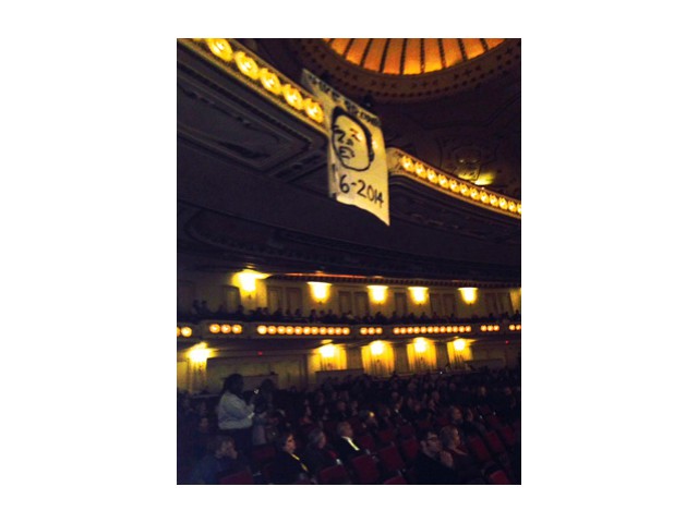 On October 4 at St. Louis Symphony Hall,  people in audience sang “Which Side Are You On?” as protest banners were unfurled. AP photo