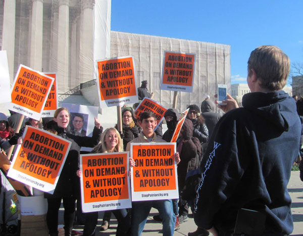 High school students on civics tour at Supreme Court join in