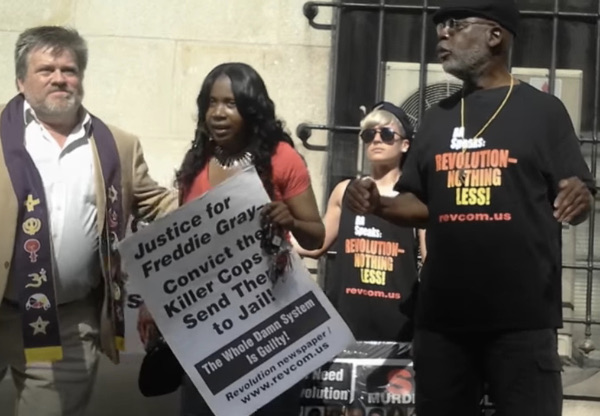 Carl Dix, of the Revolutionary Communist Party, co-founder of the Stop Mass Incarceration Network with Dr. Cornel West; Tawanda Jones, sister of Tyrone West, who was murdered by Baltimore police on July 18, 2013; and Rev. Carl David Olson, Minister, First Unitarian Church of Baltimore.