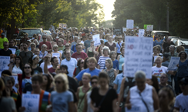 Hundreds march July 20 for Justine Damon and all victims of police violence.