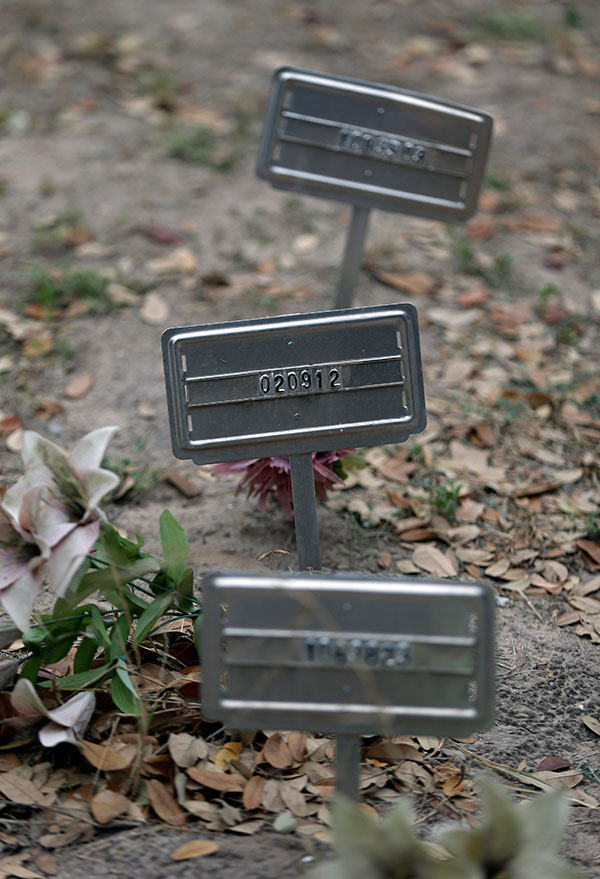 Three grave markers.