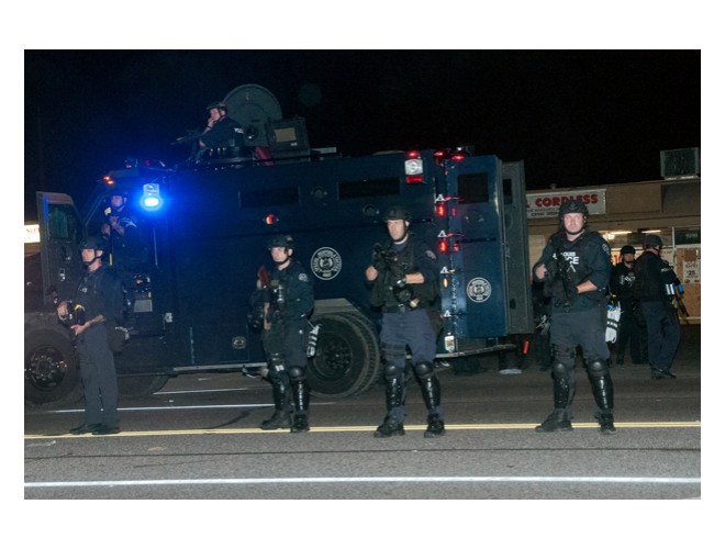 Monday August 18: In response to the righteous resistance of the people a new level of repression was put into effect in Ferguson. Photo: Li Onesto/revcom.us