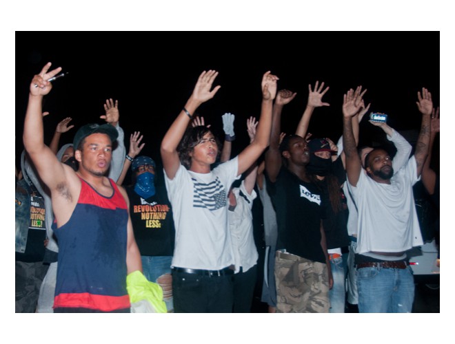 Ferguson, August 16 Saturday night protesting curfew.  Photo: Li Onesto/Revolution