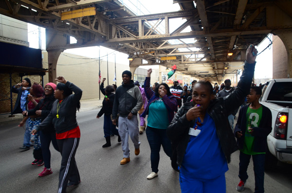 Raason Shaw - marching in the street to protest his murder by police.  Photo: Marcus Robinson