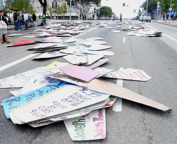 615 coffins lying on the streets in downtown LA.