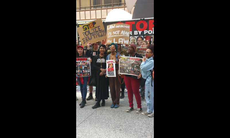 Chicago: DePaul students singing the 'I Can't Breathe' song at the rally. Photo: special to revcom.us