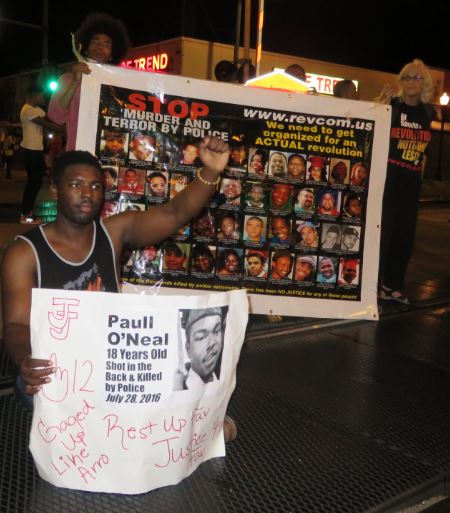 Blocking a communter train, Chicago, August 5.