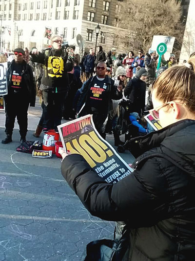 Agitating at Battery Park in NYC, rally against Trump's ban on travel from seven countries, i.e. the 'ban on Muslims'