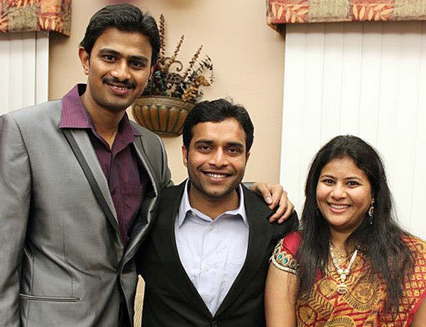 Srinivas Kuchibhotla, left, poses with Alok Madasani and his wife, Sunayana Dumala