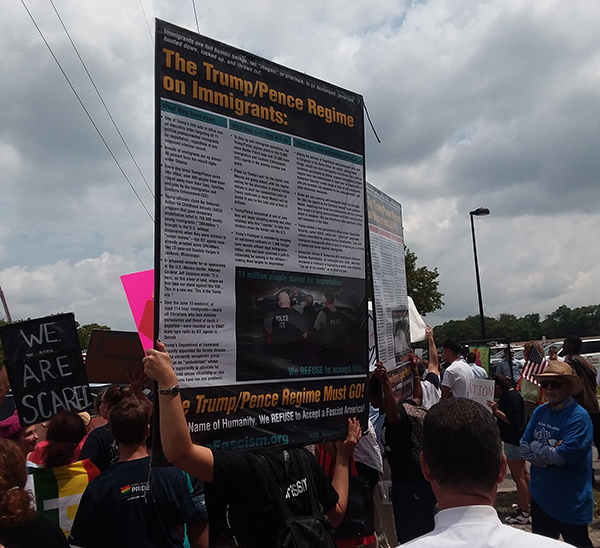 Protesters in Long Island: “Trump and Pence Regime Must Go.”