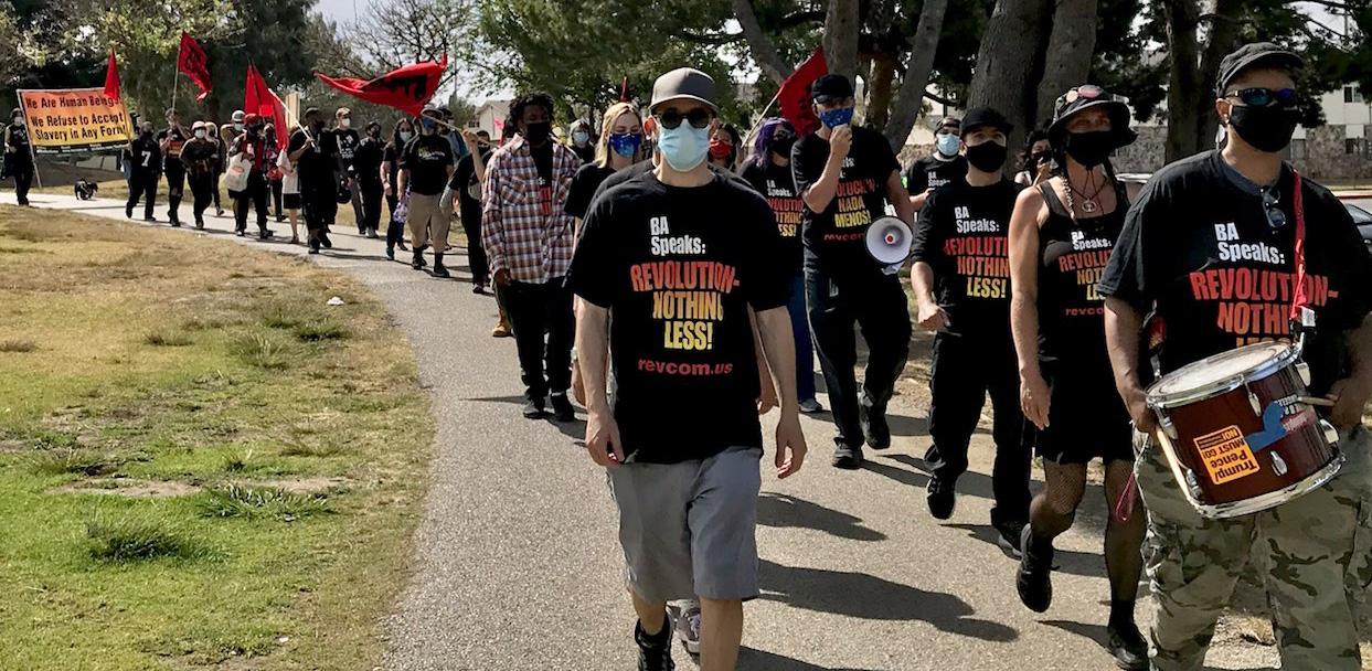 Los Angeles Revolution Club and others march on May 1, 2021.