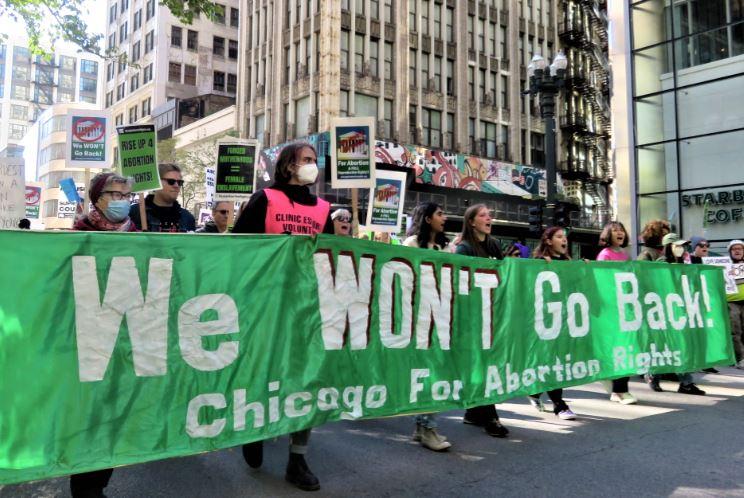 Chicago women's march, lead banner, "We Won't Go Back," October 8, 2022.