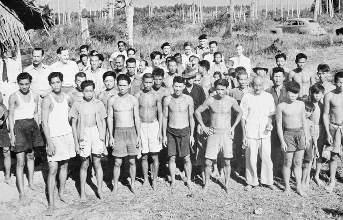 Ethnic Chinese-Malay squatters, forcibly relocated by the British as part of the Briggs' Plan, a counterinsurgency strategy used by Britain.
