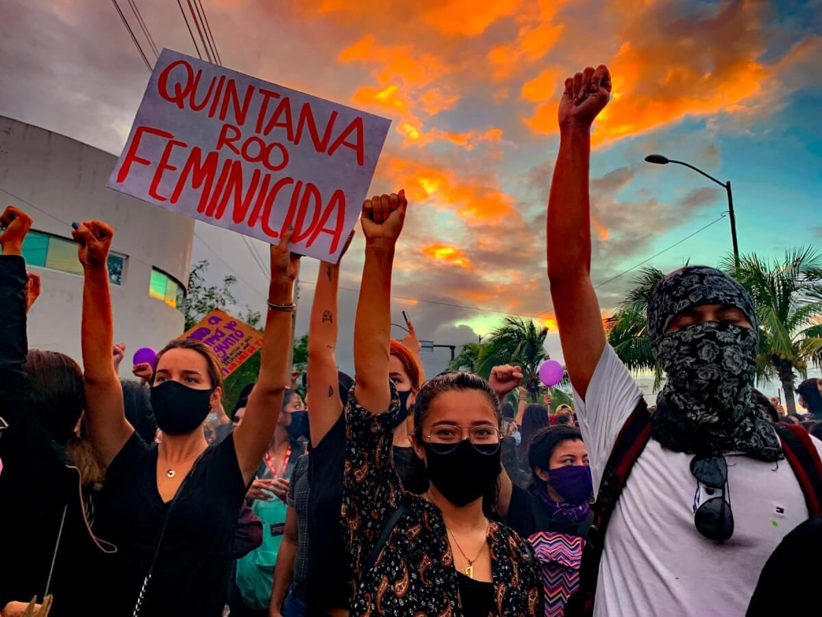 Women protest femicide in Cancun Mexico.