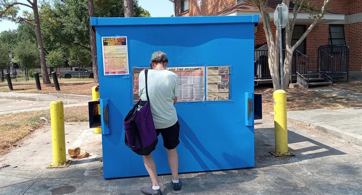 RevComs saturate Third Ward, Houston, Texas with revolution posters.