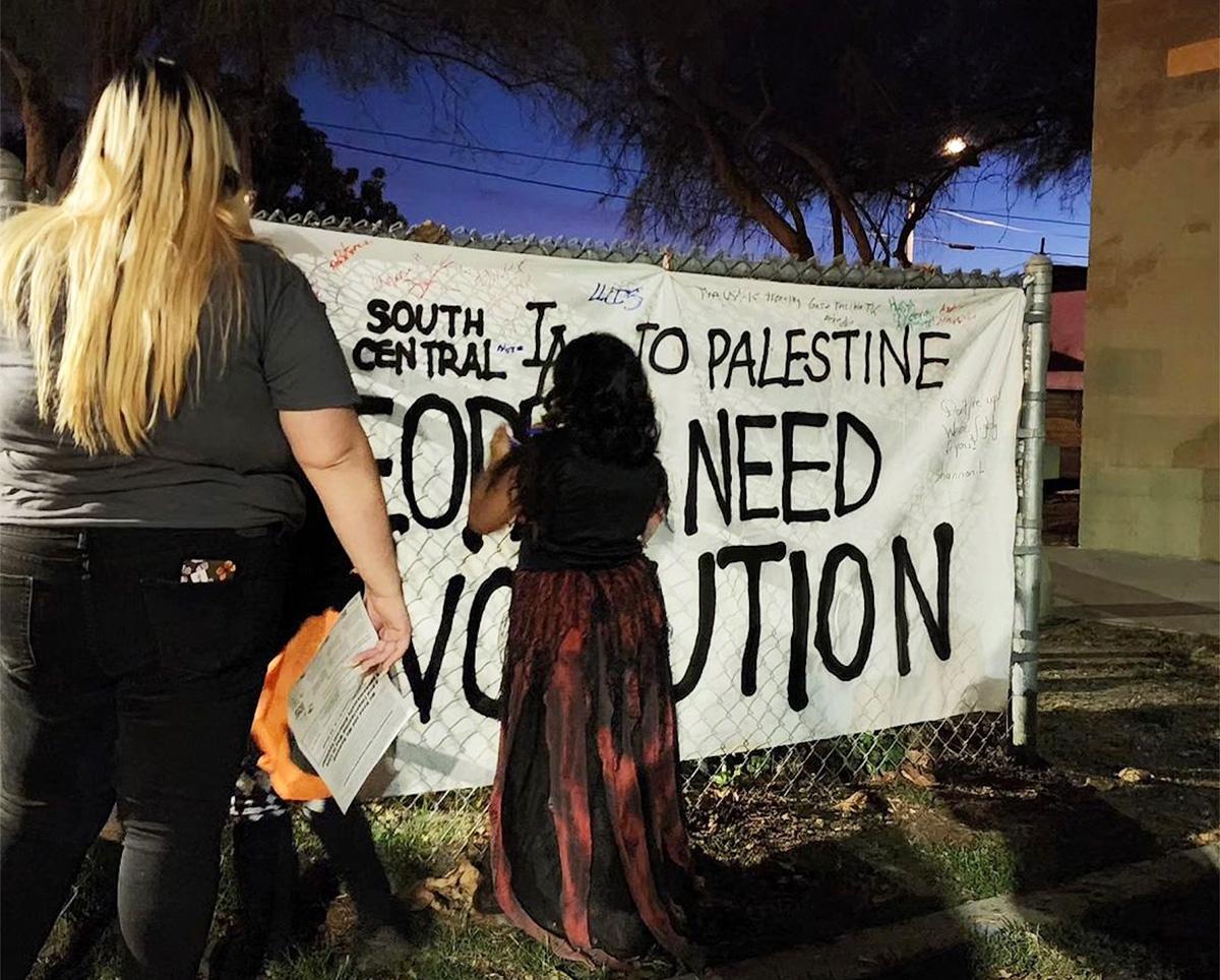 South Central, LA: Banner for Week of Revolution, November 3, 2023.