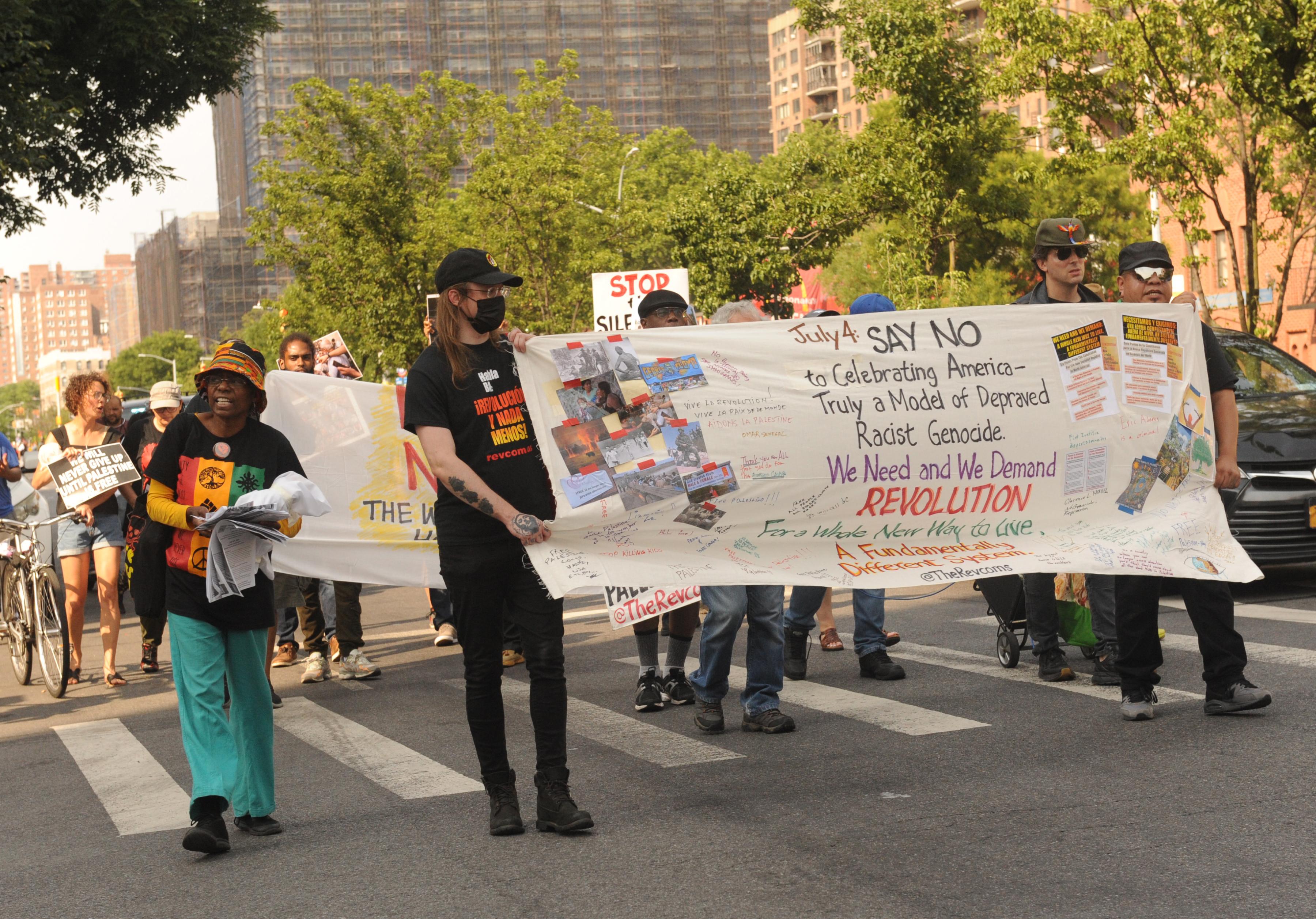 March with banner July 4: Say No to celebrating America