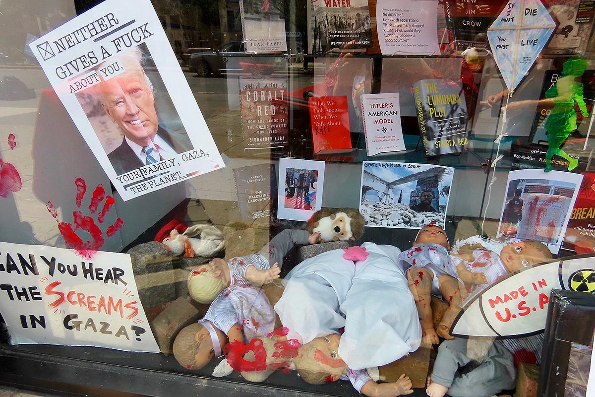Revolution Books NYC window display done by artist for July 4, 2024.