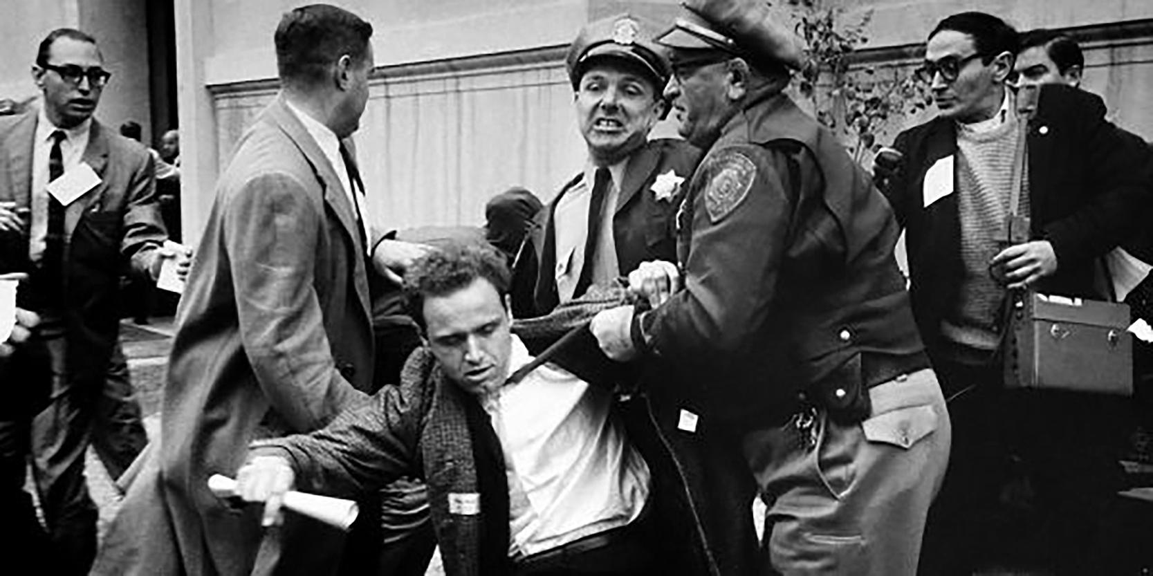 Free Speech Movement: Arresting Mario Savio, October 1964.