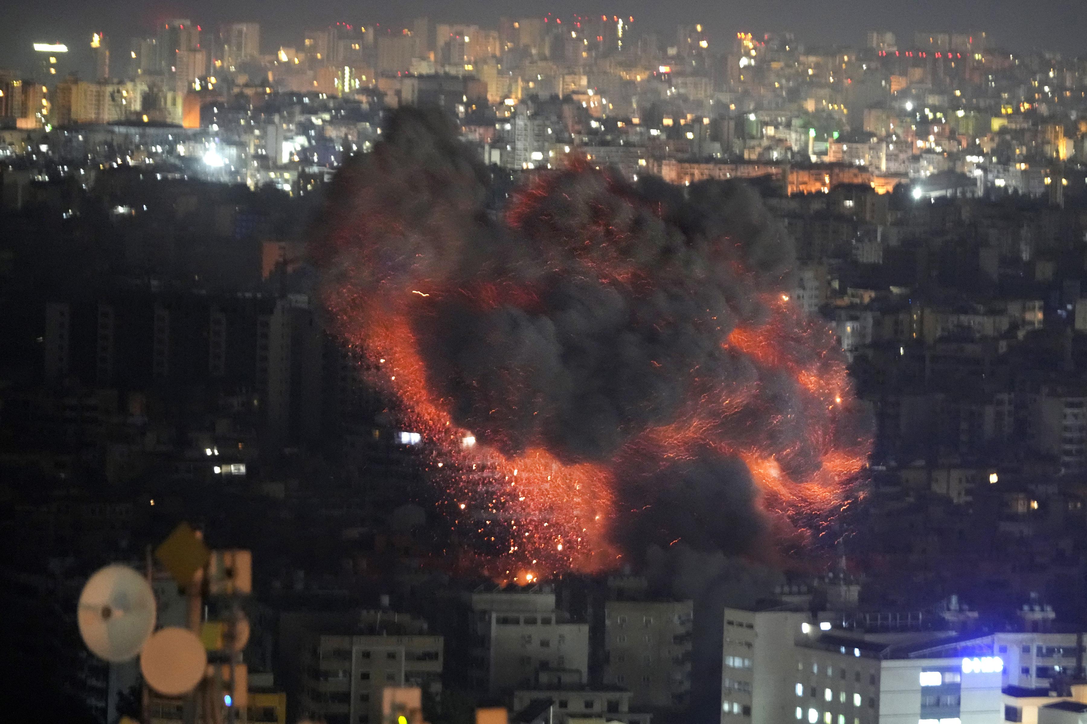 Flames from Israeli airstrikes on Dahiyeh, in the southern suburb of Beirut, October 23, 2024.