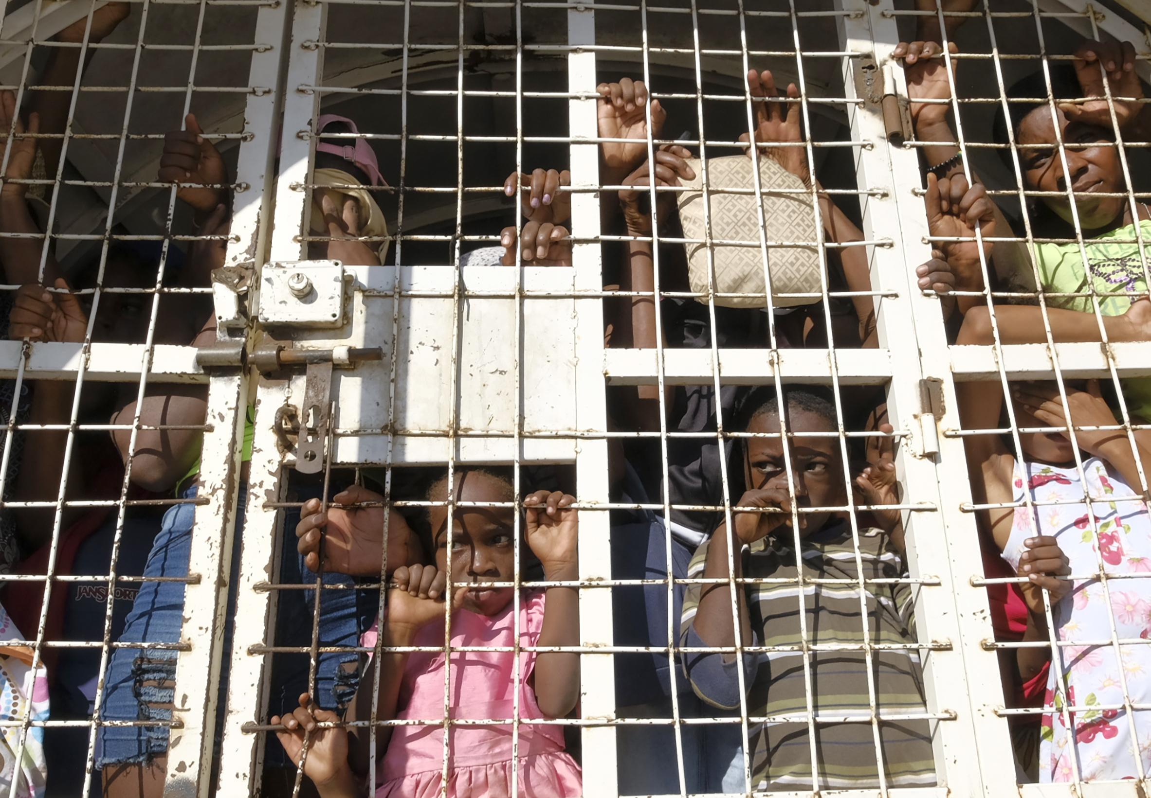 Haitians including children in cages being deported from Dominican Republic to Haiti, October 11, 2023.