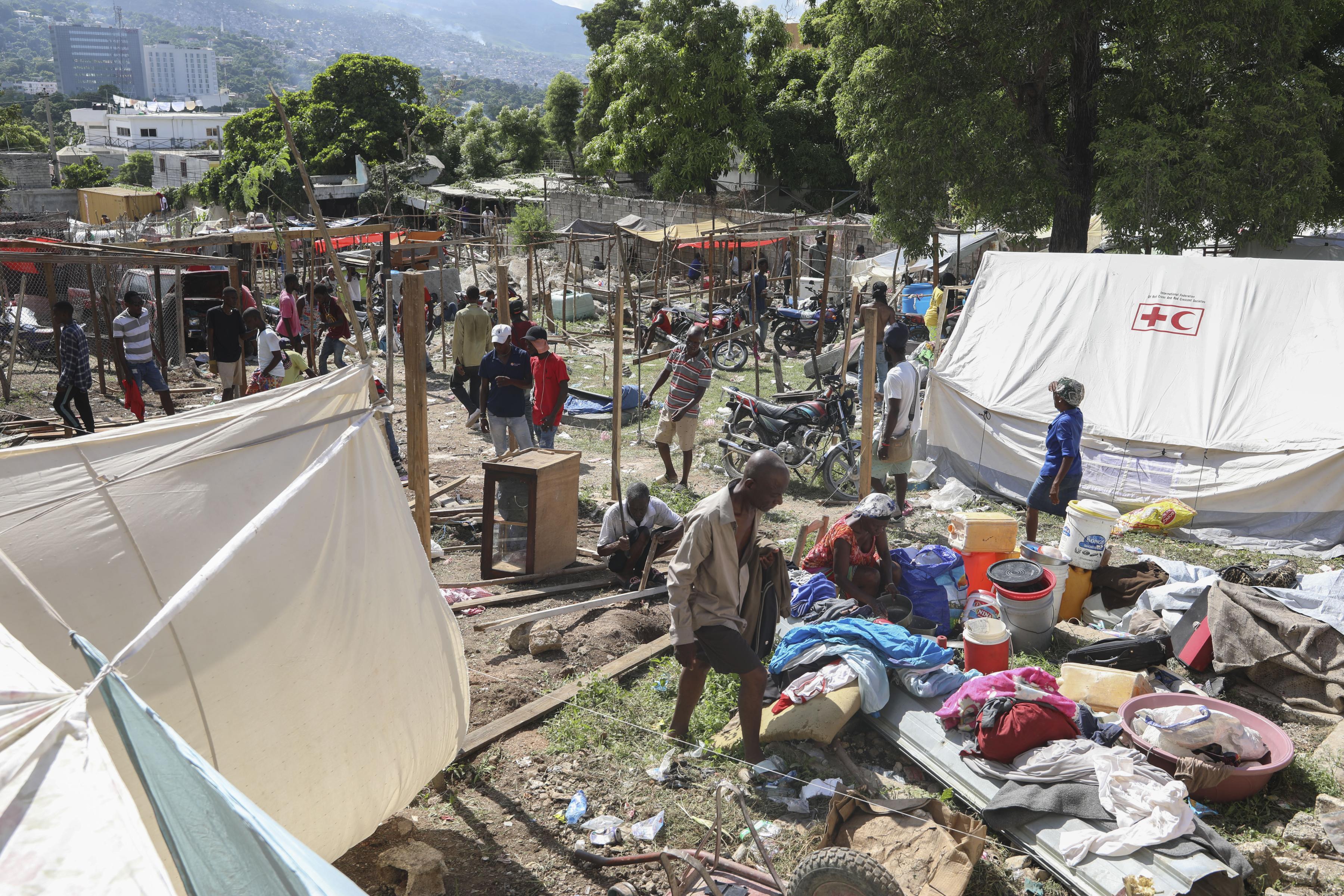Here people displaced by gang violence construct a tent encampment, in Port-au-Prince, November 15, 2024.
