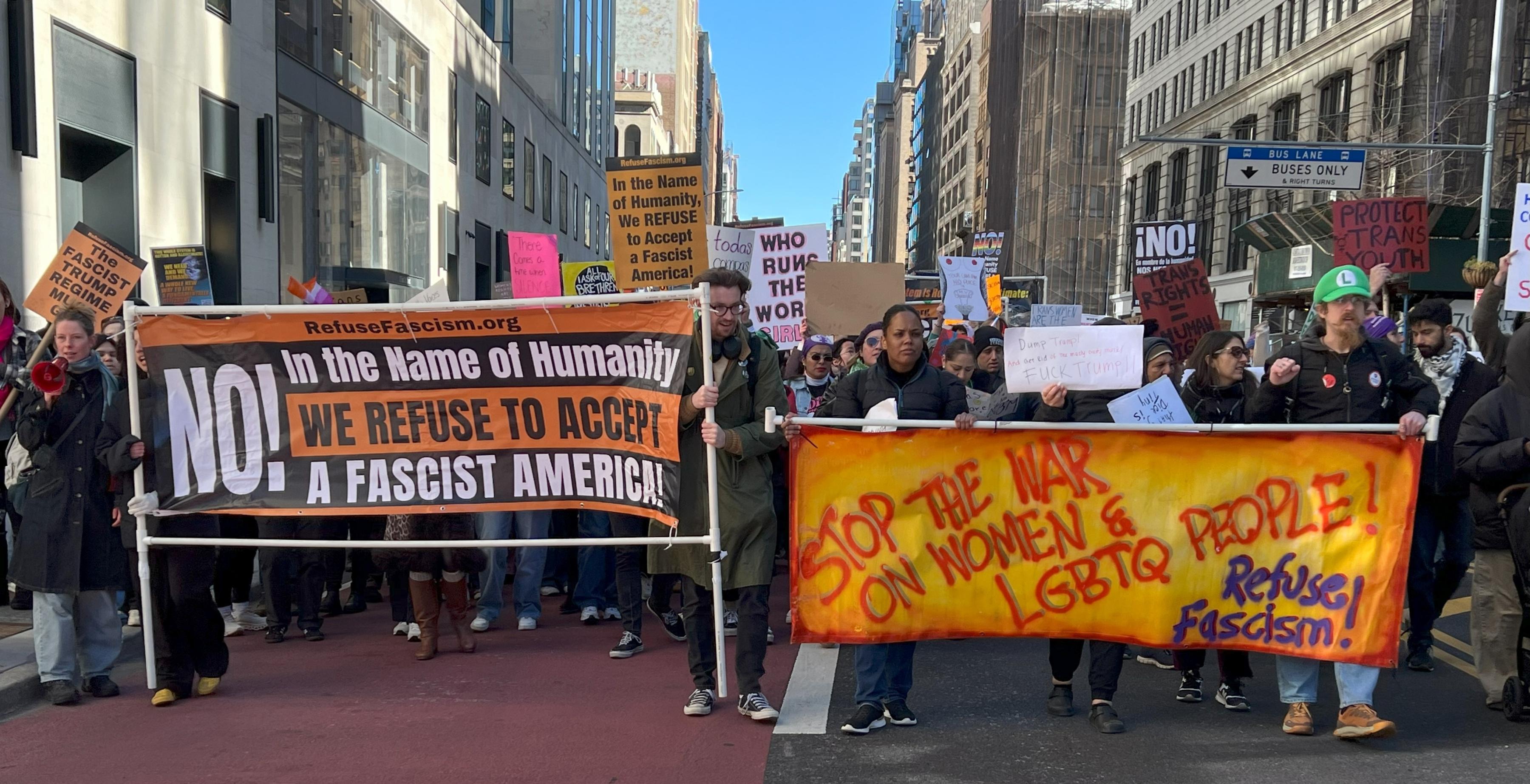 International Women's Day march in New York City lead by Refuse Fascism banners.