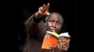 Ngugi wa Thiong'o reading from his book.