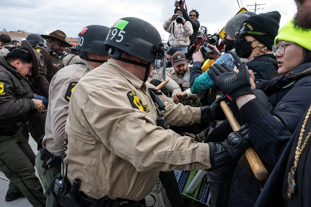 Cops push protesters at ICE detention center Broadview, Illinois, November 1, 2025.
