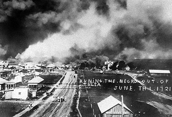 Black neighborhood of Greenwood burned down by white racist mobs during Tulsa Massacre, 1921.