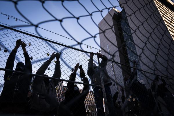 People hang "locks for loved ones" murdered by police awaiting Chauvin verdict