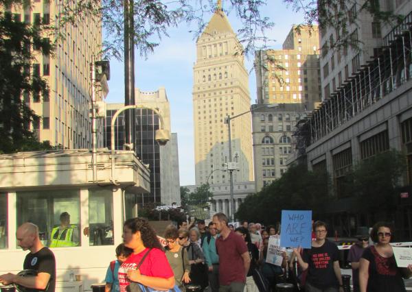 Protest for immigrants rights under massive surveillance at New York City Hall. Park