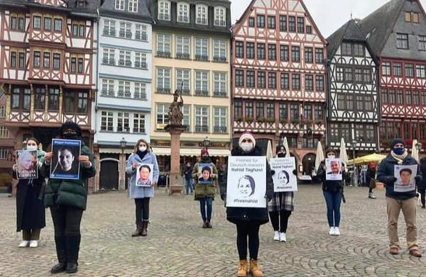Protest for Iran political prisoners, includes sign for Navid Taghavi