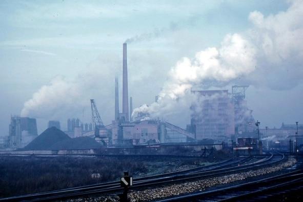 CO2 emissions/pollution from smokestacks at coal power plant.