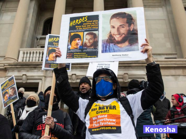 Protest Rittenhouse verdict in front of Kenosha Courthouse with sign of slain heroes.