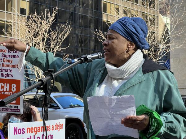Lovette speaking for abortion rights at St. Patrick's Cathedral.