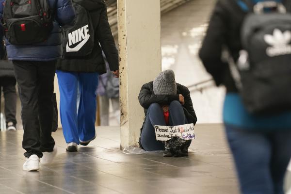 Homeless beg for help in New York City subway.