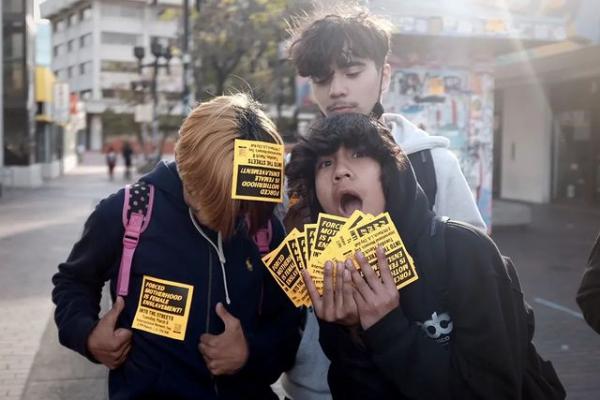 Skater kids take Forced Motherhood is Female Enslavement stickers to put up everywhere