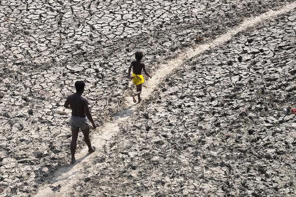 India extreme heatwave dried Yamuna River near New Delhi.